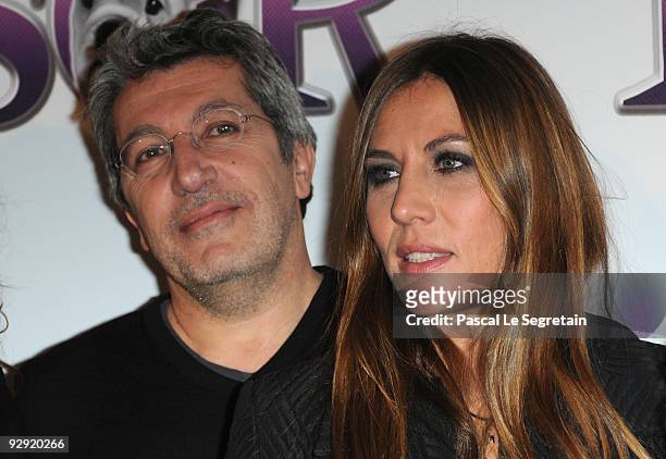 Actors Alain Chabat and Mathilde Seigner pose as they attend the premiere of the directors Claude Berry and Francois Dupeyron's film "Tresor" at...