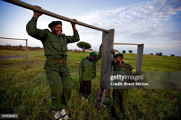 Scenes from ICCN Ranger post at Ishango. The Rangers are seen cleaning weapons at the end of a patrol and then using the pull-up bars at the camp for...