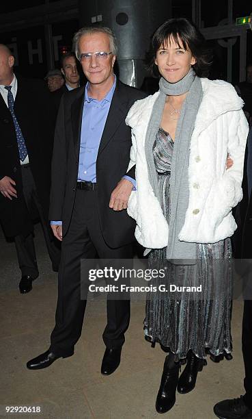 Actors Christopher Lambert and his companion Sophie Marceau attend the premiere of "L'Homme de chevet" at Cinematheque Francaise on November 9, 2009...