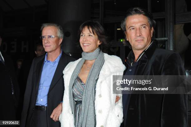 Actors Christopher Lambert and his companion, Sophie Marceau and director Alain Monne attend the premiere of "L'Homme de chevet" at Cinematheque...