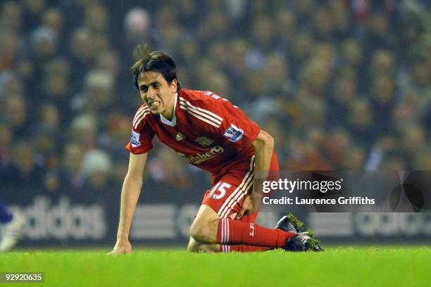 Yossi Benayoun of Liverpool sustains an injury during the Barclays Premier League match between Liverpool and Birmingham City at Anfield on November...