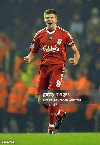 Steven Gerrard of Liverpool celebrates scoring his team's second goal from the penalty spot during the Barclays Premier League match between...