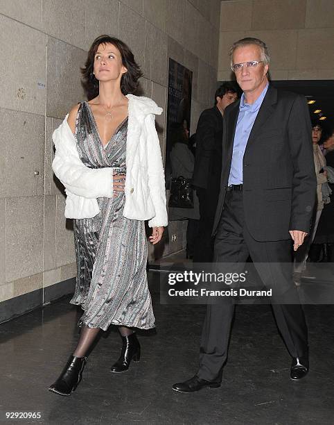 Actors Sophie Marceau and her companion Christopher Lambert attend the premiere of "L'Homme de chevet" at Cinematheque Francaise on November 9, 2009...