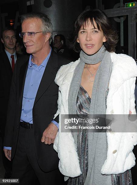 Actors Christopher Lambert and his companion Sophie Marceau attend the premiere of "L'Homme de chevet" at Cinematheque Francaise on November 9, 2009...