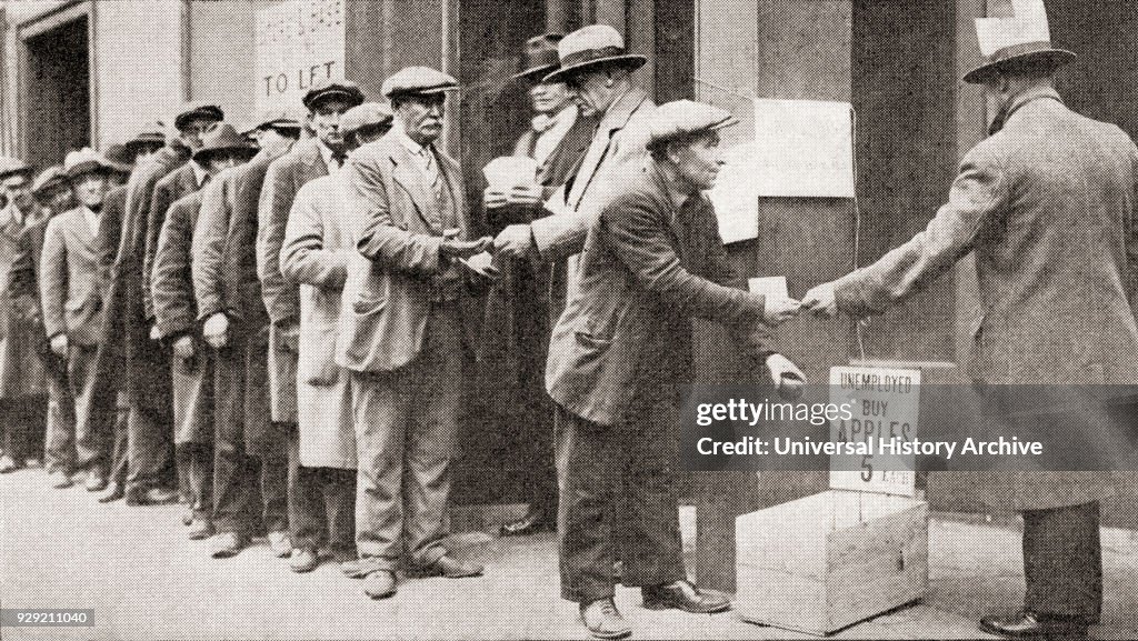A line of unemployed men buy apples for 5 cents during the Great Depression of America