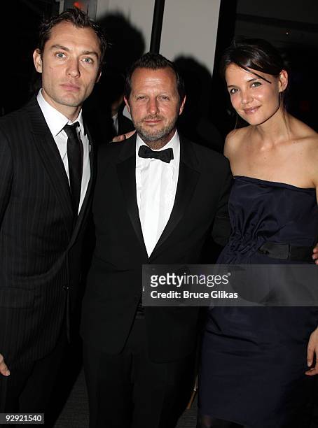 Jude Law, Rob Ashford and Katie Holmes pose at the Stage Directors And Choreographers Society 50 Year Celebration at Tribeca Rooftop on November 8,...