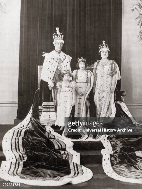 George VI on the day of his coronation with his wife Queen Elizabeth and their daughters Princess Elizabeth, right, and Princess Margaret, left, 12th...
