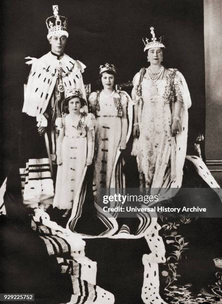 King George VI and his wife Queen Elizabeth seen here the day of their coronation, 12 May with their daughters Princess Margaret and Princess...