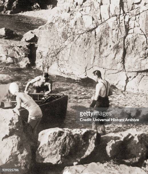 King Edward VIII and his future wife Mrs. Simpson bathing at Dubrovnik during their Mediterranean cruise of 1936. Edward VIII, 1894 – 1972. King of...