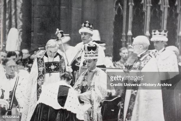 King George VI receives the homage of princes and peers following his coronation in 1937. George VI, Albert Frederick Arthur George, 1895 to 1952....