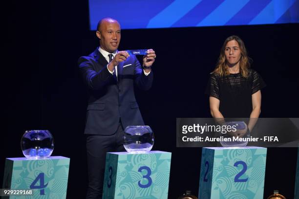 Mikael Silvestre announces countries during the official draw for the FIFA U-20 Women's World Cup France 2018 on March 8, 2018 in Rennes, France.