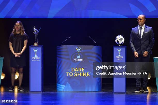 Ambassadors Camille Abily and Mikael Silvestre wait for the beginning of the official draw for the FIFA U-20 Women's World Cup France 2018 on March...