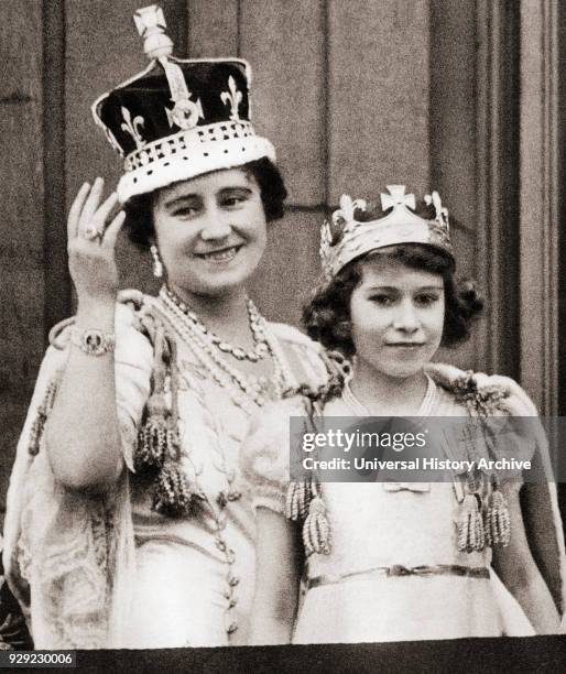 Queen Elizabeth on the day of her coronation in 1936 with her daughter Princess Elizabeth on the balcony of Buckingham Palace, London, England....