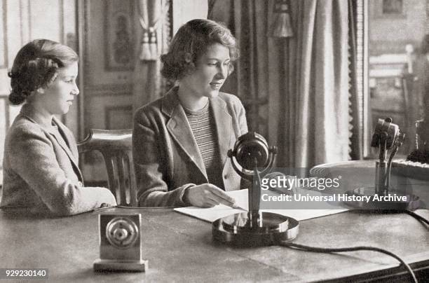 Princess Margaret, left, and Princess Elizabeth, future Queen Elizabeth II, right, broadcasting to the children of the empire, 13h October, 1940....