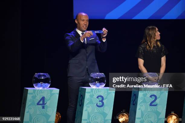 Mikael Silvestre announces countries during the official draw for the FIFA U-20 Women's World Cup France 2018 on March 8, 2018 in Rennes, France.