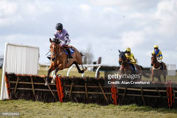Bryony Frost riding Moabit on their way to winning The Smarkets Handicap Hurdle Race at Wincanton racecourse on March 8, 2018 in Wincanton, England.