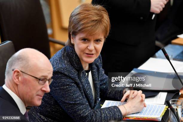 First Minister of Scotland Nicola Sturgeon answers questions during first minister's questions in the Scottish Parliament on March 8, 2018 in...