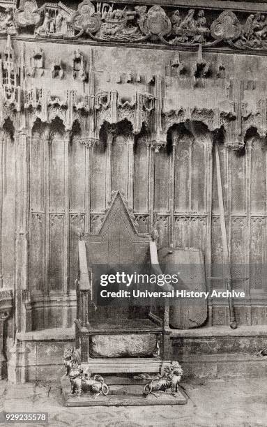 The Coronation Chair, Westminster Abbey, City of Westminster, London, England. Here seen with the Stone of Scone which was returned to Scotland in...