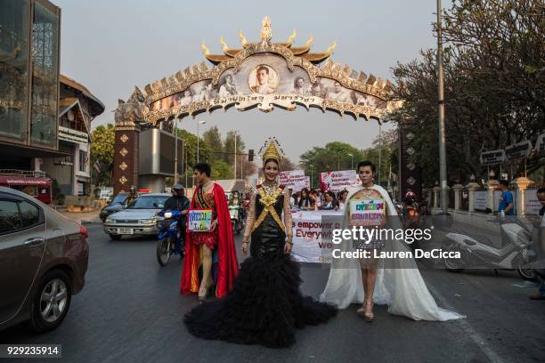 Ladyboy models participate in the annual International Women's Day March on March 8, 2018 in Chiang Mai, Thailand. Hundreds of women from several...