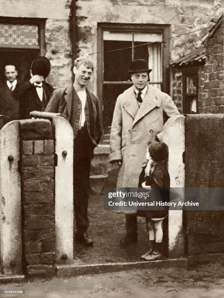 The Prince of Wales, later King Edward VIII visiting a miner's house and family in Durham in 1929