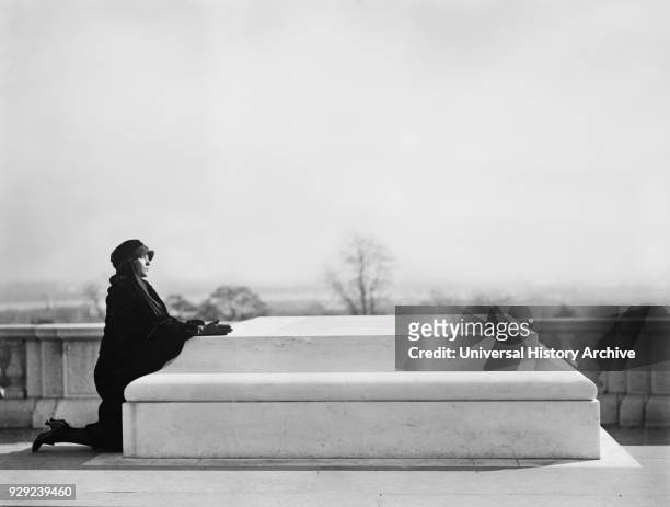 Woman Kneeling at Tomb of Unknown Soldier, Arlington National Cemetery, Arlington, Virginia, USA, Harris & Ewing, 1922.