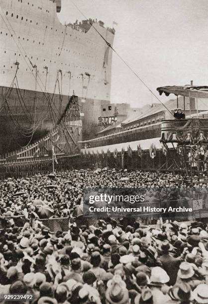 The queen launches the Cunard Liner Queen Mary, September 26, 1934 at Clydebank, Scotland. From The Illustrated London News, Silver Jubilee Record...