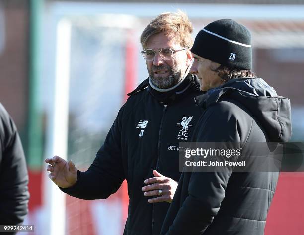 Jurgen Klopp manager of Liverpool with Zeljko Buvac First assistant coach during a training session at Melwood Training Ground on March 8, 2018 in...