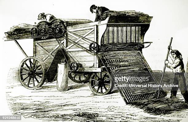 Engraving depicting a steam-driven threshing machine. Dated 19th Century.