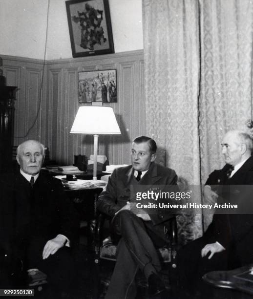 Photograph of leaders meeting in Vichy France: Marshal Philippe Petain , Admiral Francois Darlan , with the German ambassador, Otto Abetz. Dated 20th...