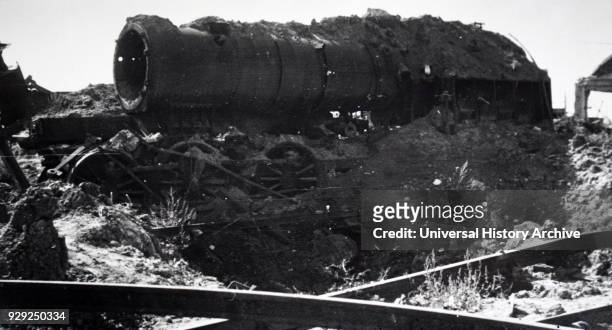 Photograph showing the wreckage of a train at Trappes, in the south-western suburbs of Paris, during the liberation of France from German occupation...