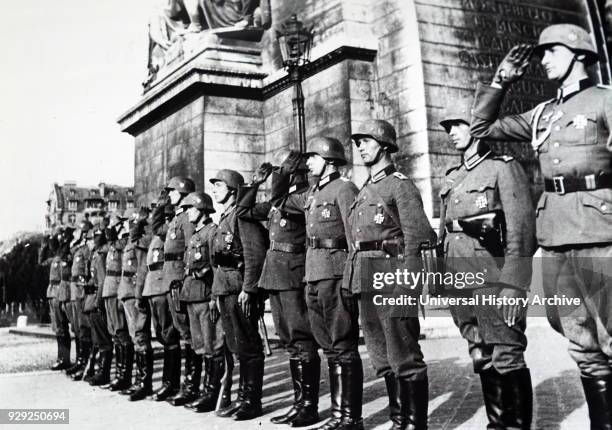 Photograph of German soldiers at the Arc de Triomphe, Paris during the invasion of France 1940. Dated 20th Century.