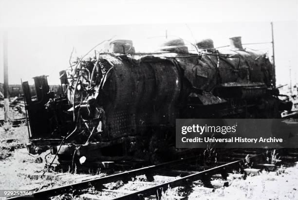 Photograph showing the wreckage of a train at Trappes, in the south-western suburbs of Paris, during the liberation of France from German occupation...