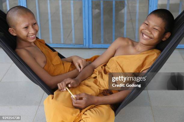 Novice monks in hammocks. Cambodia.