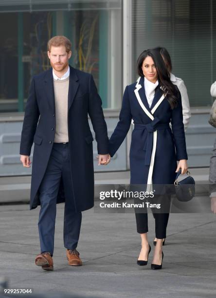 Prince Harry and Meghan Markle depart after visiting Millennium Point on March 8, 2018 in Birmingham, England.