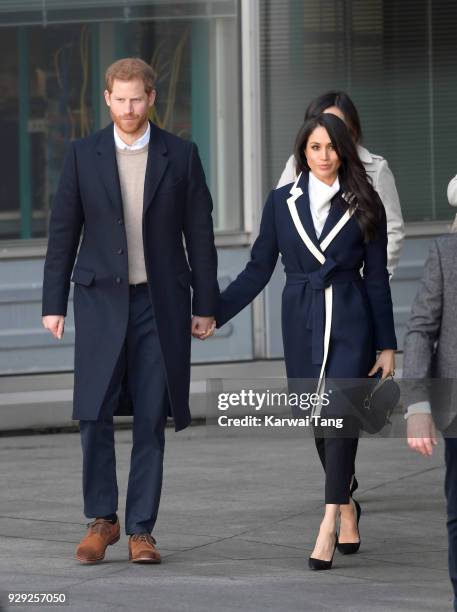 Prince Harry and Meghan Markle depart after visiting Millennium Point on March 8, 2018 in Birmingham, England.