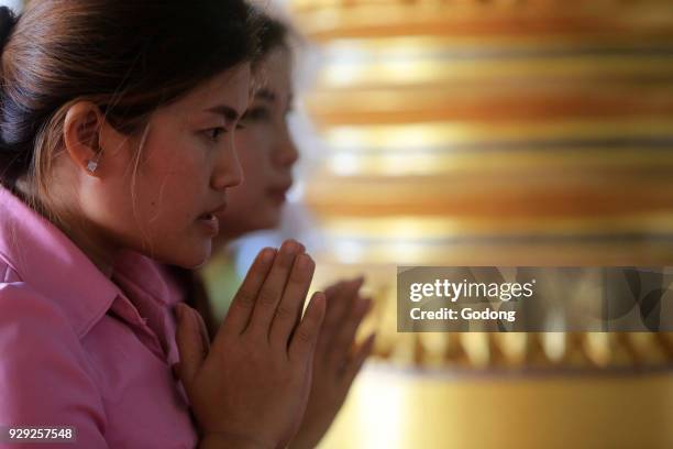 Buddhist ceremony. Wat Ong Teu Mahawihan. Temple of the Heavy Buddha. Vientiane, Laos.