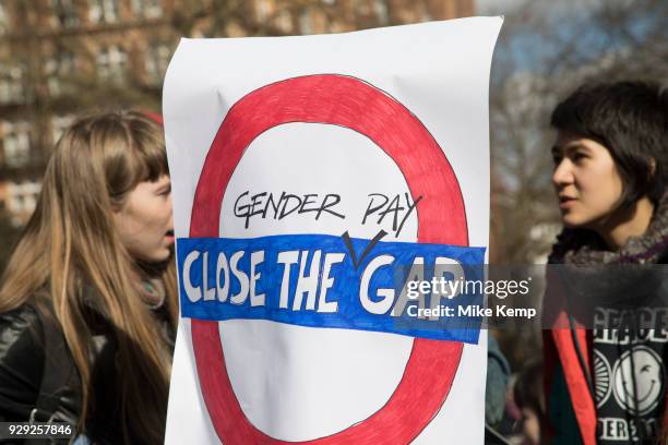 Hundreds of women gather in Russell Square for the Women's Strike Assembly on International Women's Day on 8th March 2018 in London, England, United...