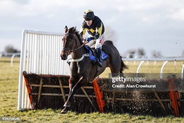 Tom Scudamore riding Storm Home clear the last to win The Smarkets Novices' Hurdle Race at Wincanton racecourse on March 8, 2018 in Wincanton,...