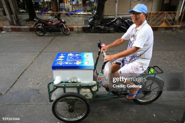 Seller ice flowing tricycle. Bangkok, Thailand.