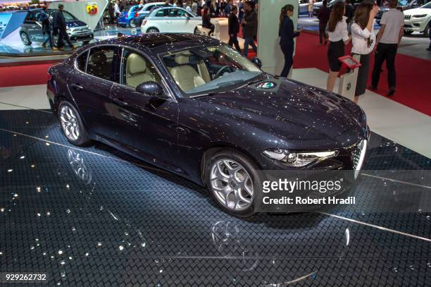 Alfa Romeo Giulia is displayed at the 88th Geneva International Motor Show on March 7, 2018 in Geneva, Switzerland. Global automakers are converging...