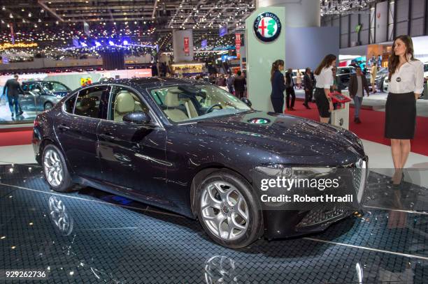 Alfa Romeo Giulia is displayed at the 88th Geneva International Motor Show on March 7, 2018 in Geneva, Switzerland. Global automakers are converging...