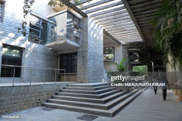 This photograph taken on March 8, 2018 shows a view of the campus of the Indian Institute of Management Bangalore designed by the Indian architect...