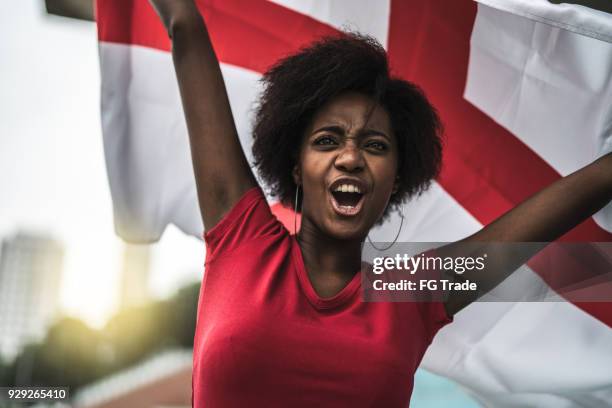 english fan watching a soccer game - england fans stock pictures, royalty-free photos & images