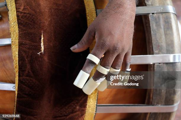 Musician Playing Drum During a Traditional Hindu Ceremony. Sri Mariamman Hindu temple. Singapore.