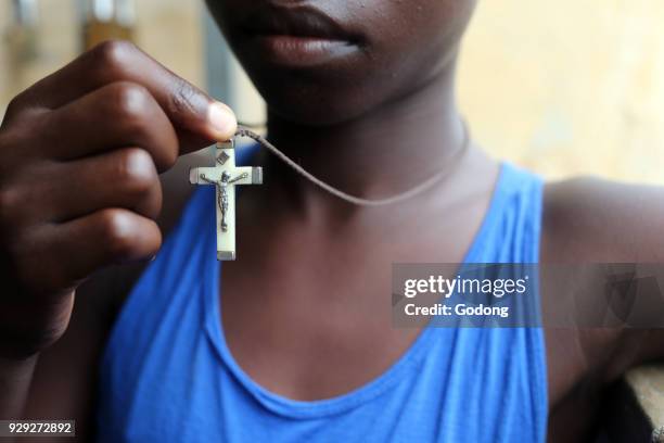 Pendant with Jesus christ crucified. Lome, Togo.