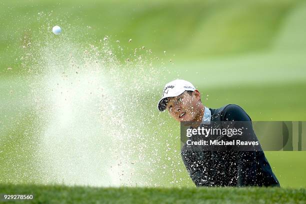 Michael Kim plays a shot from a bunker on the second hole during the first round of the Valspar Championship at Innisbrook Resort Copperhead Course...