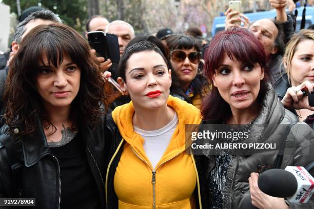Italian actress Asia Argento along with US singer and actress Rose McGowan , who both accuse Harvey Weinstein of sexual assault, and Italian showgirl...