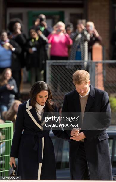 Prince Harry and Meghan Markle visit Nechells Wellbeing Centre to join Coach Core apprentices taking part in a training masterclass on March 8, 2018...