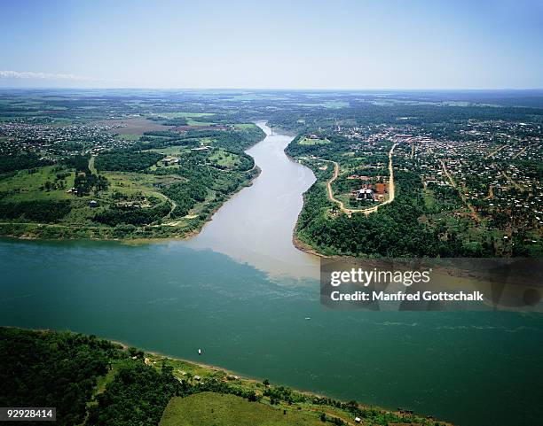 iguacu and parana rivers confluence , argentina , brazil , paraguay - paraguay stock pictures, royalty-free photos & images