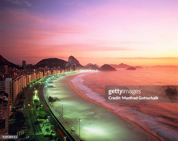 1 018 Copacabana Beach Sunset Stock Photos High Res Pictures And 1-018-copacabana-beach-sunset-stock-photos-high-res-pictures-and